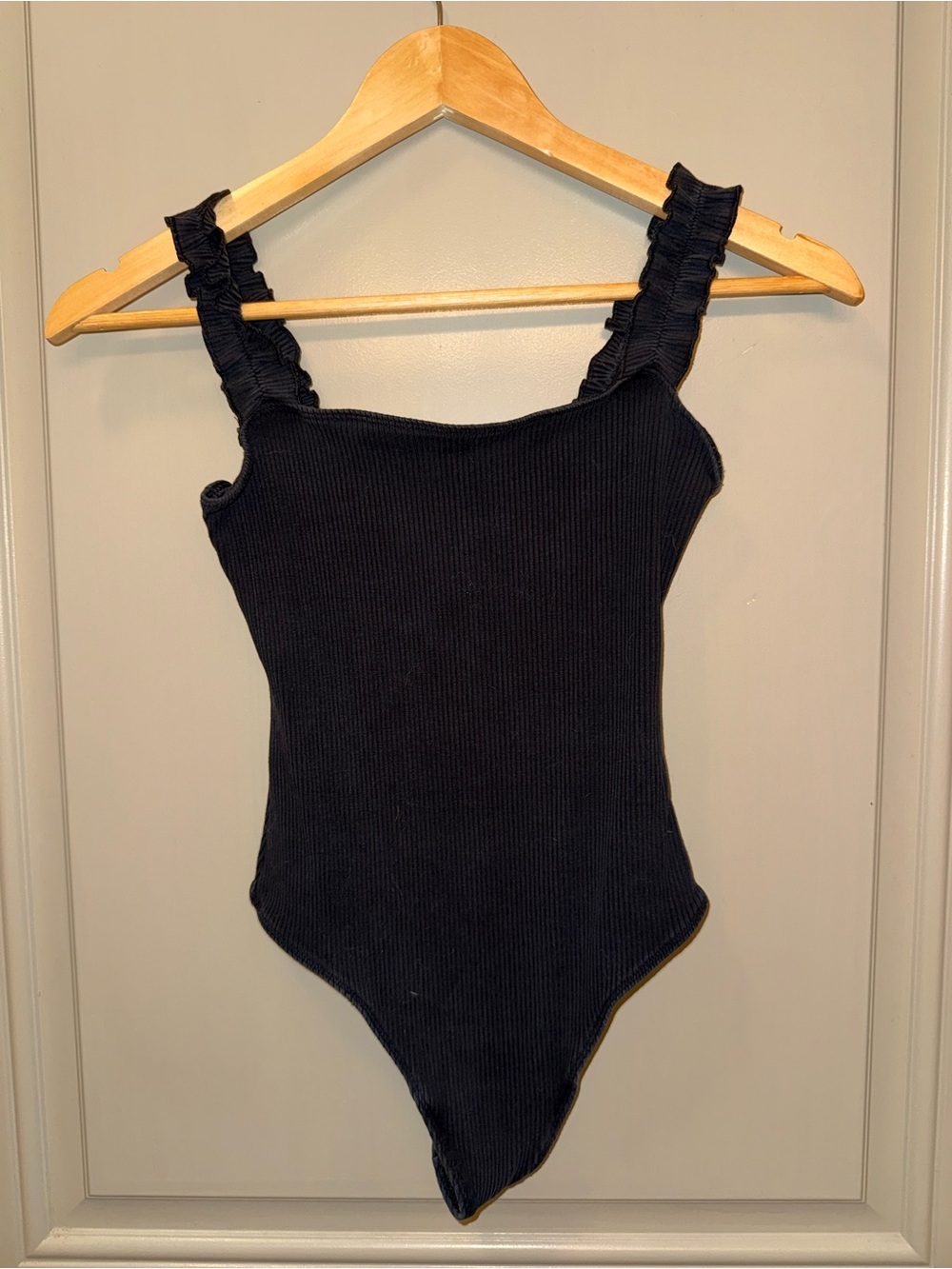 Aritzia Black Ribbed Ruffle-Strap Bodysuit